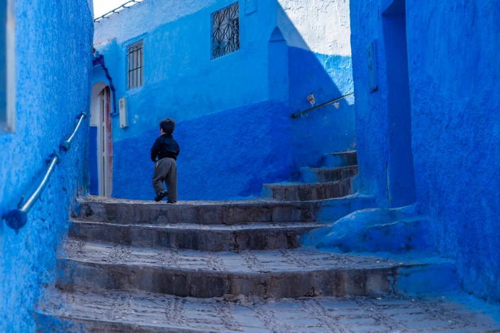 World PescArt Photo - Running from McCurry, Chefchaouen, Morocco