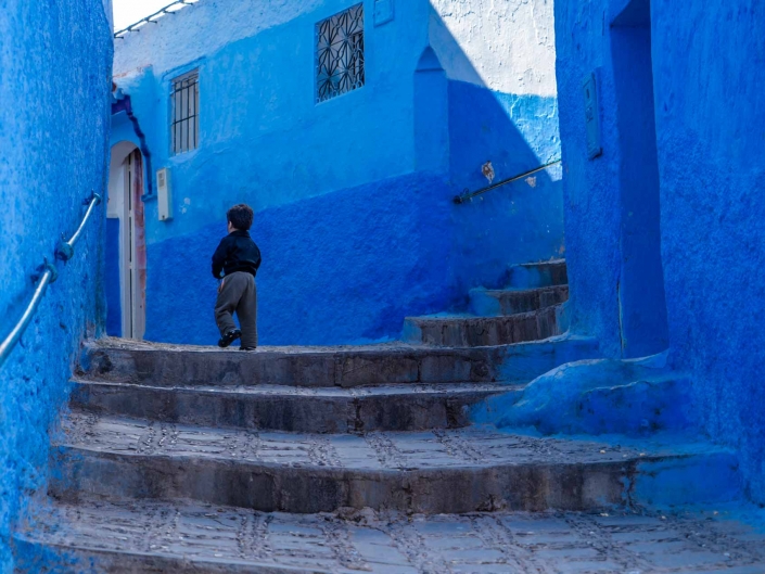 Morocco Chefchaouen - Running from Steve McCurry