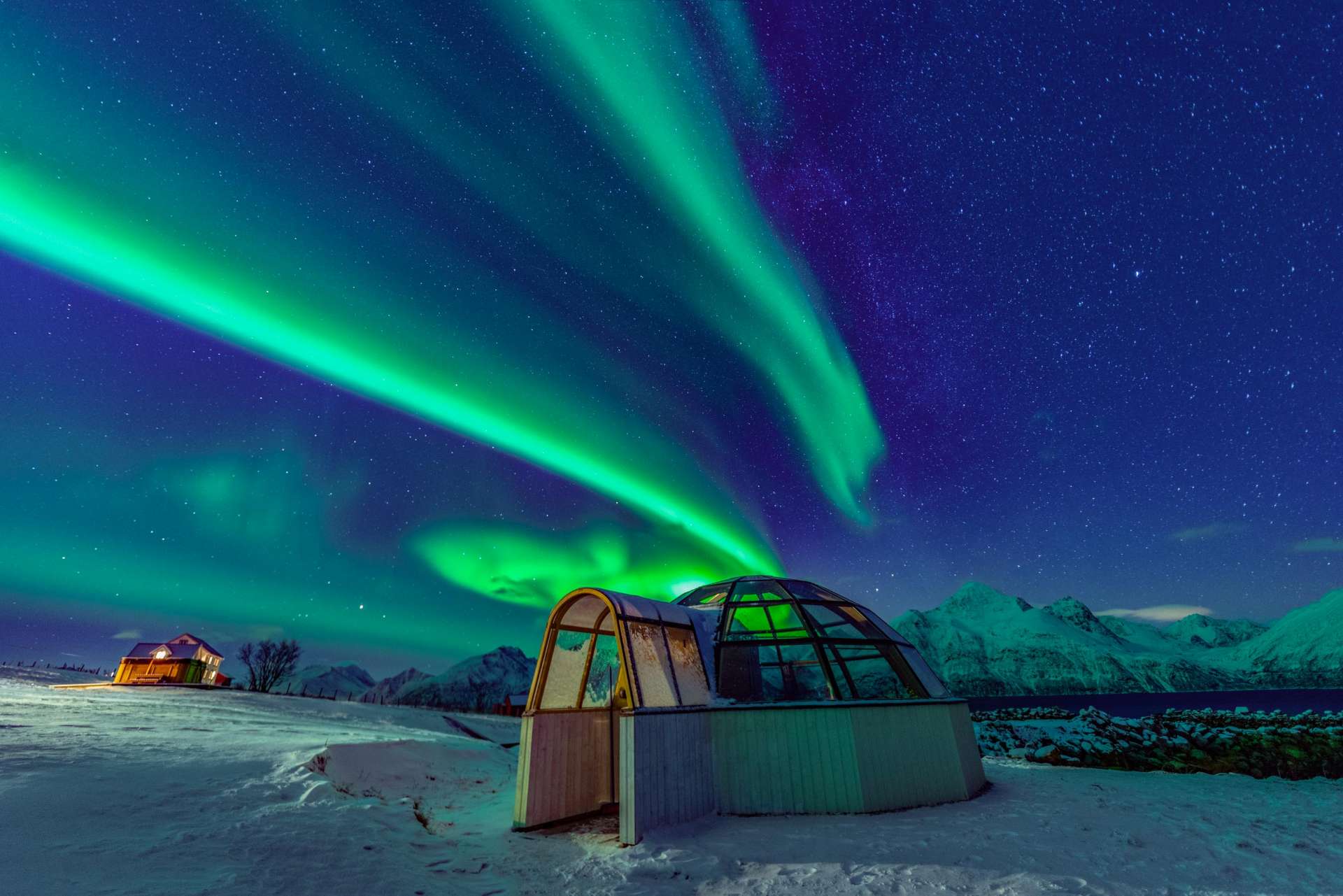 Watching Aurora From A Glass Igloo