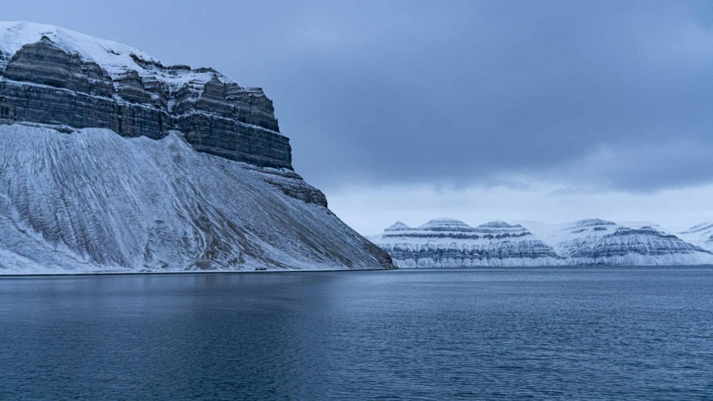 svalbard cruise fjord mountain winter