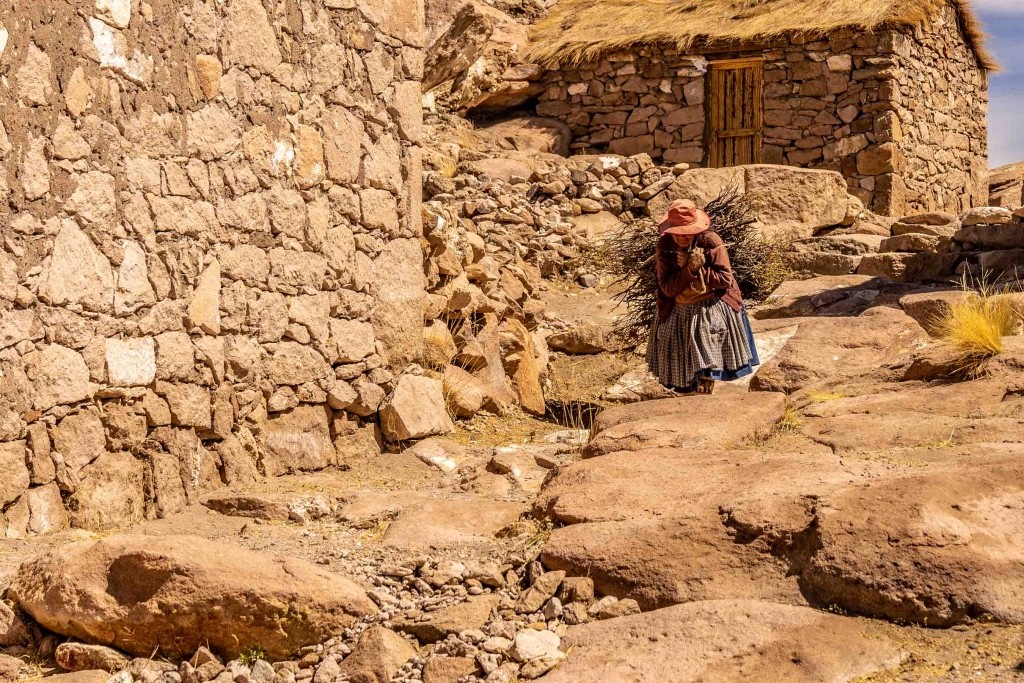 Salar de Uyuni Bolivia world largest salt flat stone village old lady