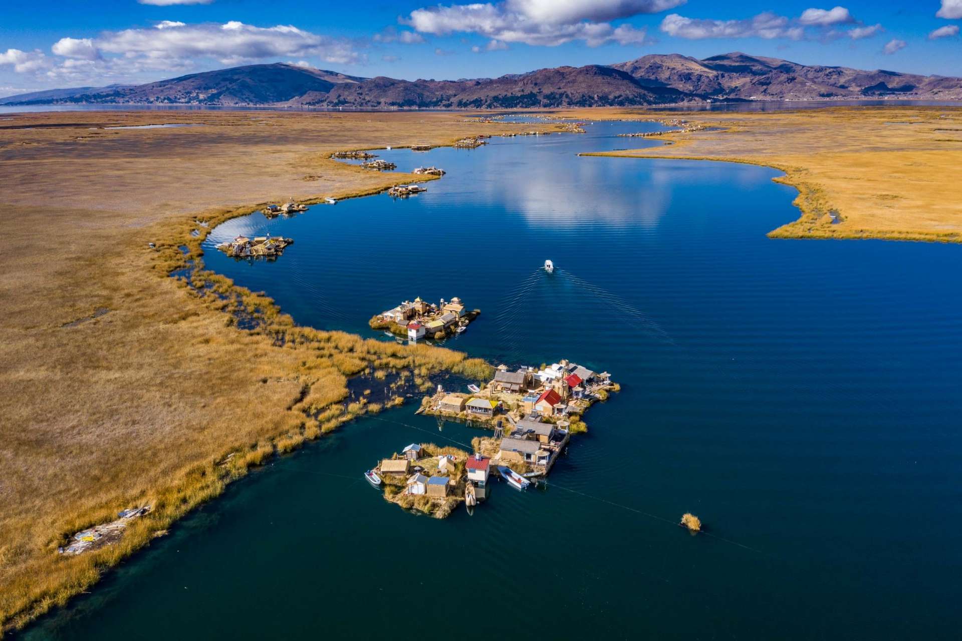 Uros Floating Islands Titicaca Lake Puno Peru aerial drone shot 3