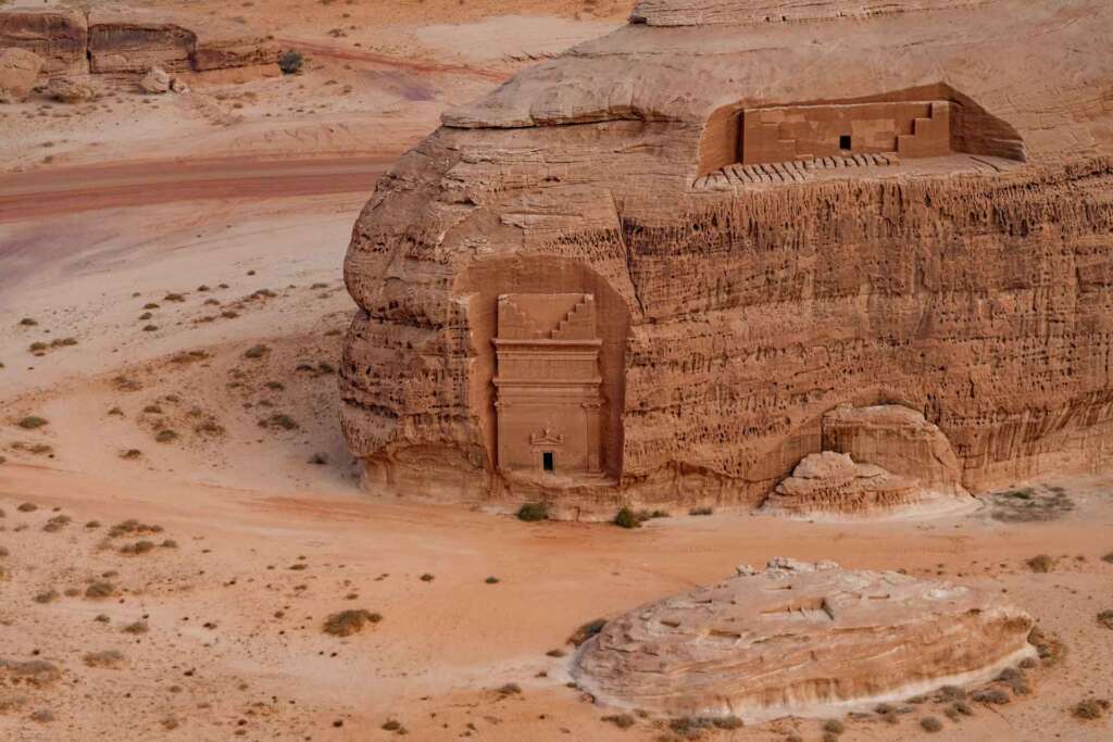 al ula saudi arabia hegra archeological site aerial helicopter drone view