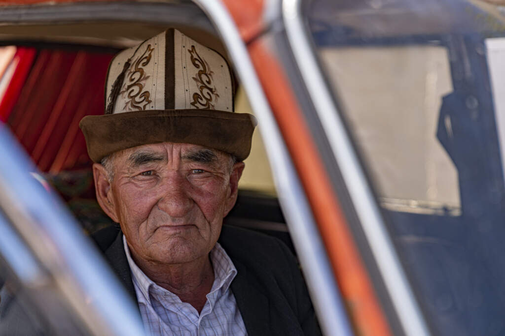 Kyrgyzstan old man in old car